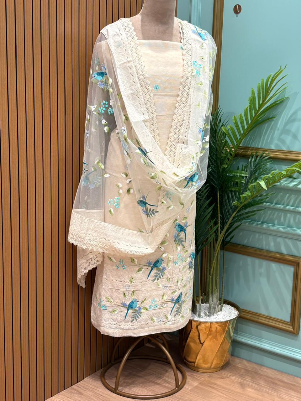 Graceful unstitched suit set is crafted in soft Kota cotton fabric