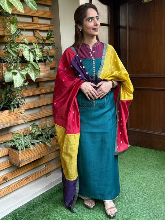 Elegant unstitched suit is crafted in premium Maheshwari fabric