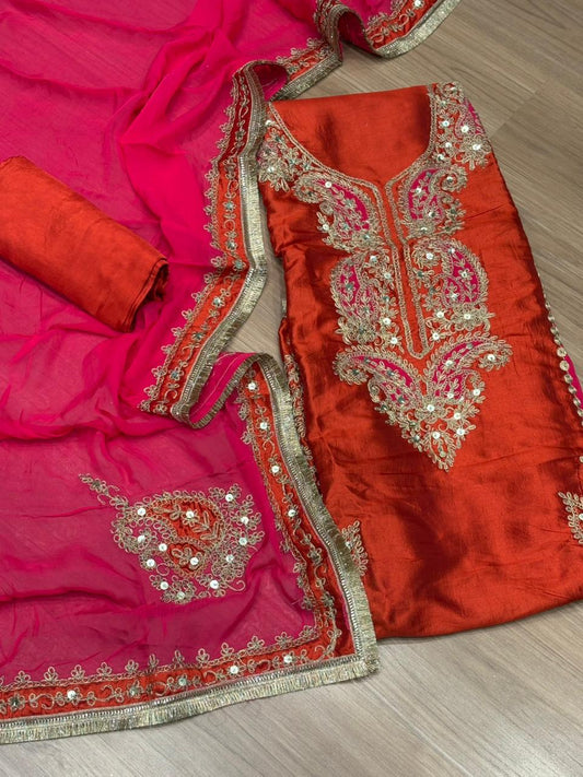 Elegant unstitched suit is crafted in rich silk fabric