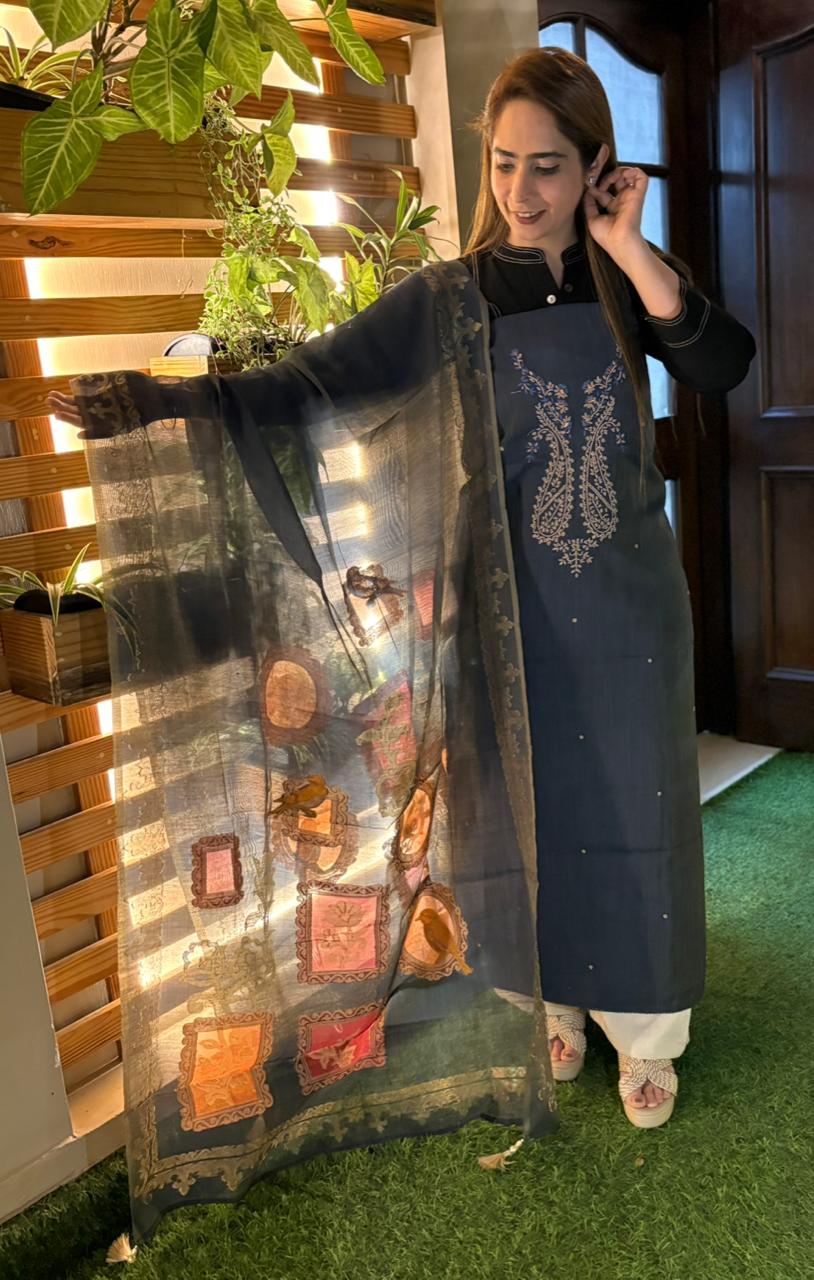 Experience timeless elegance with this unstitched suit