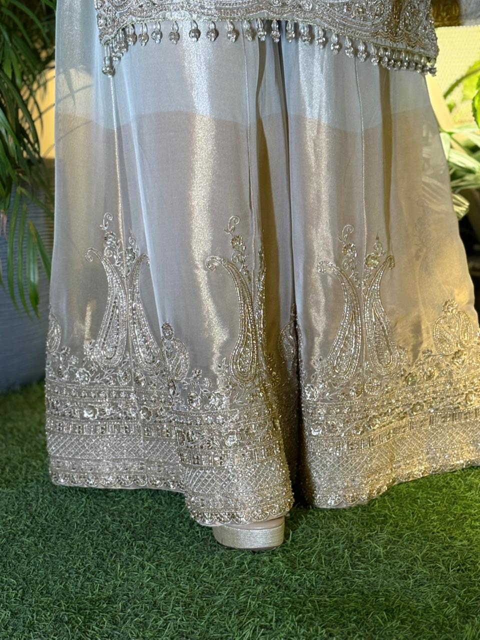 Exquisite kurta set crafted in pure tissue silk fabric