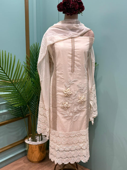 Graceful and timeless, this beautiful unstitched cotton suit