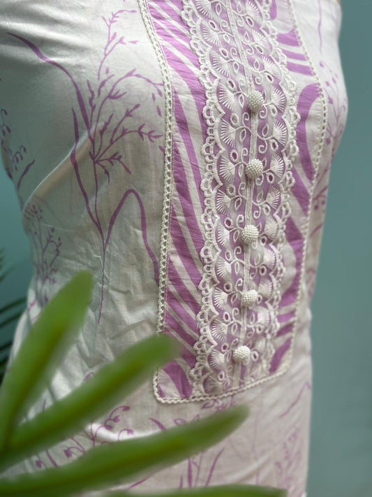 Elegant unstitched suit set is crafted from soft and breathable cotton fabric