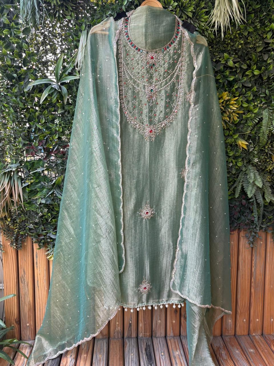 Unstitched suit in luxurious tissue shimmer fabric