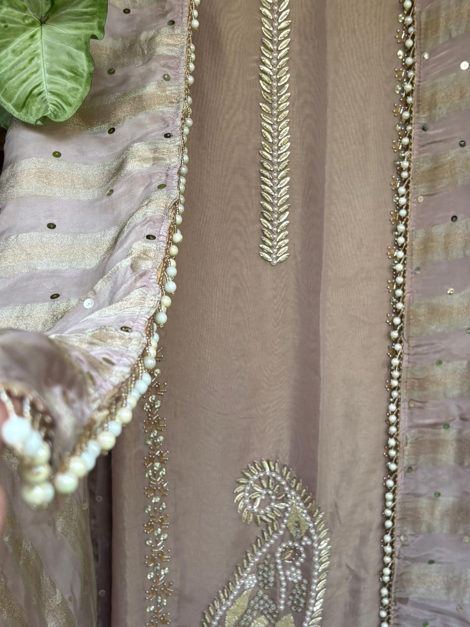 Unstitched suit crafted in rich tissue shimmer fabric