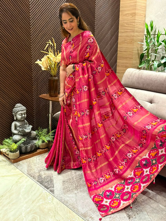 Elegant Patola Running Saree paired with an unstitched blouse