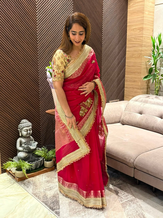 Crafted in luxurious soft organza running saree