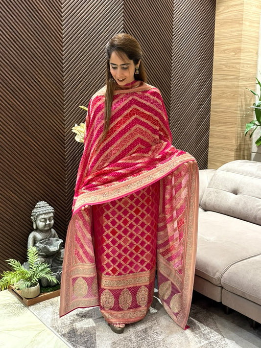 Unstitched suit features luxurious Khadi Georgette