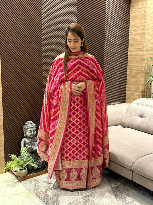Unstitched suit features luxurious Khadi Georgette