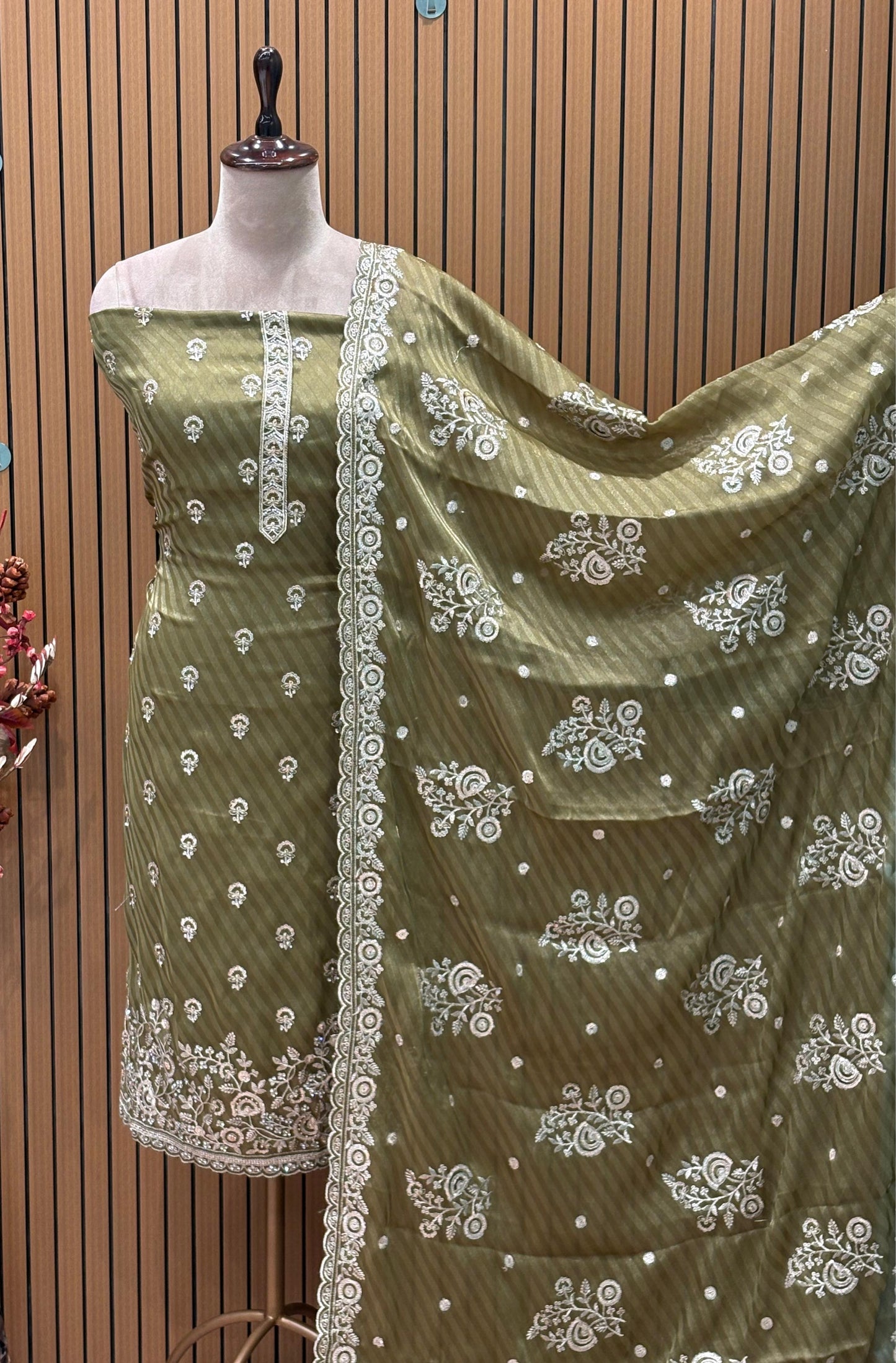 Elevate your festive wardrobe with our luxurious unstitched suit set