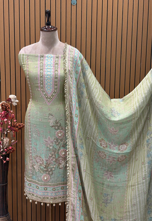 Step into elegance with this exquisite unstitched suit set