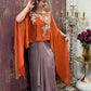 Elegant crop top with dhoti skirt and flowing cape