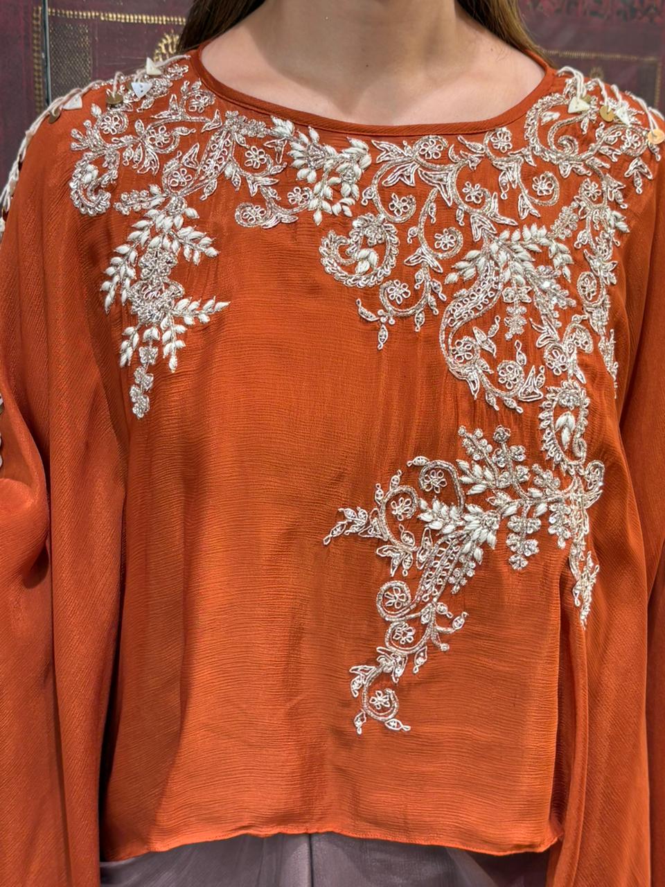 Elegant crop top with dhoti skirt and flowing cape