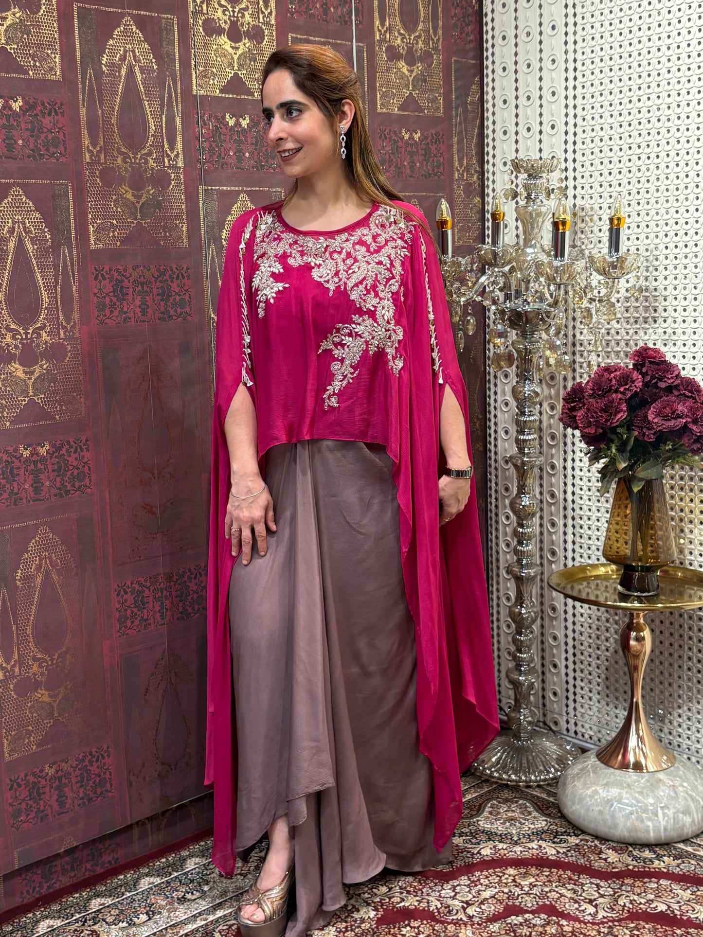 Elegant crop top with dhoti skirt and flowing cape