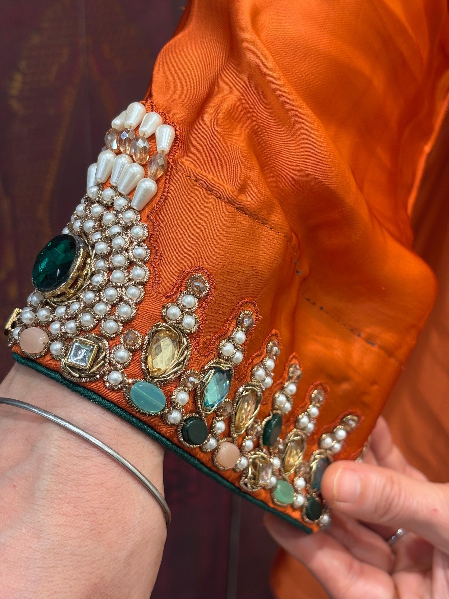 Elegant short kurta set is crafted in luxurious satin crape fabric