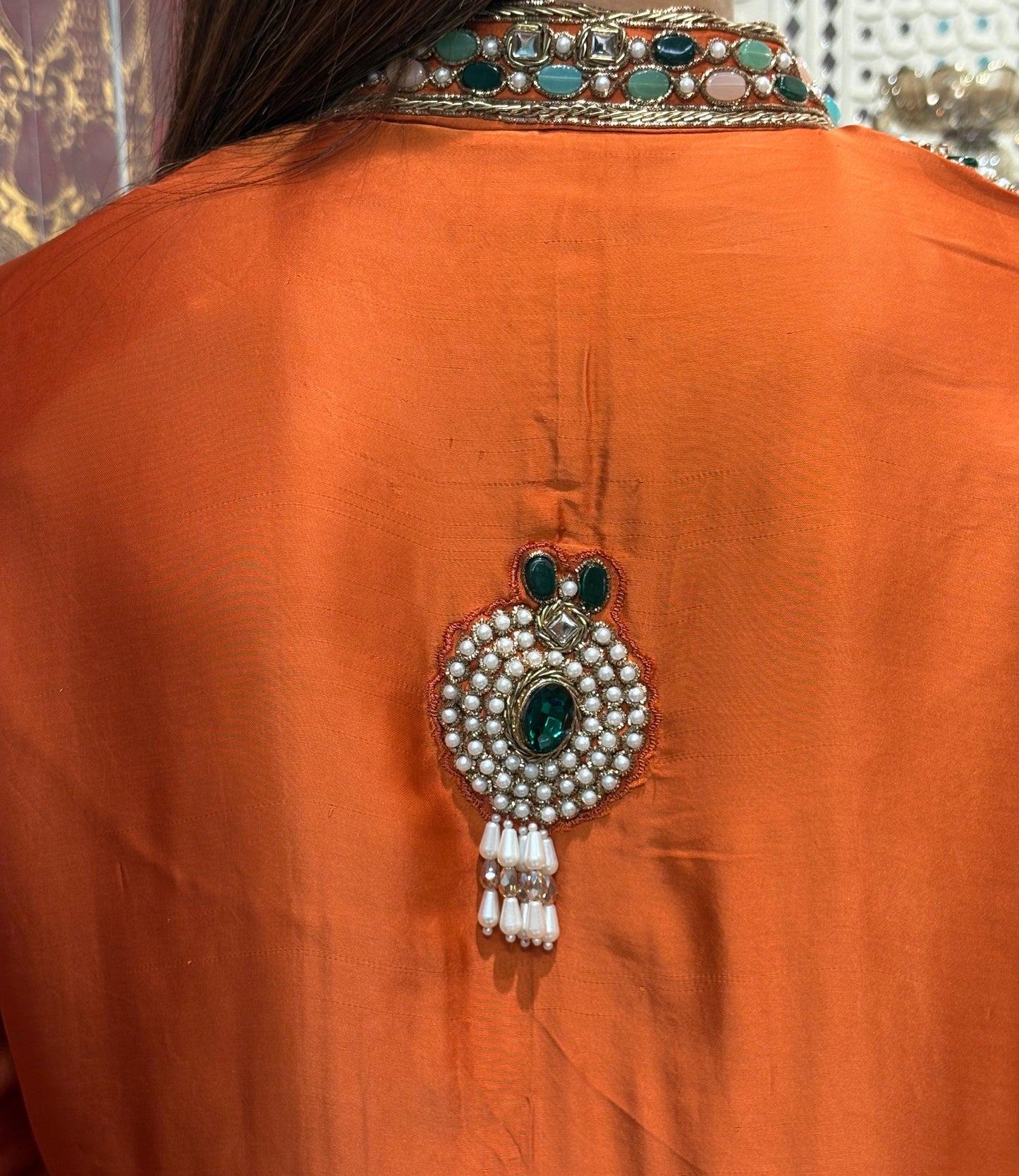 Elegant short kurta set is crafted in luxurious satin crape fabric