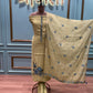 Olive green unstitched suit fabric with delicate blue floral embroidery