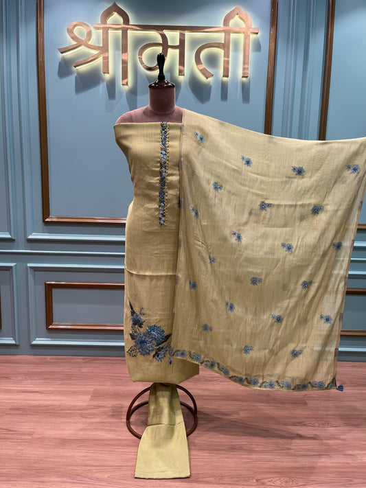 Olive green unstitched suit fabric with delicate blue floral embroidery