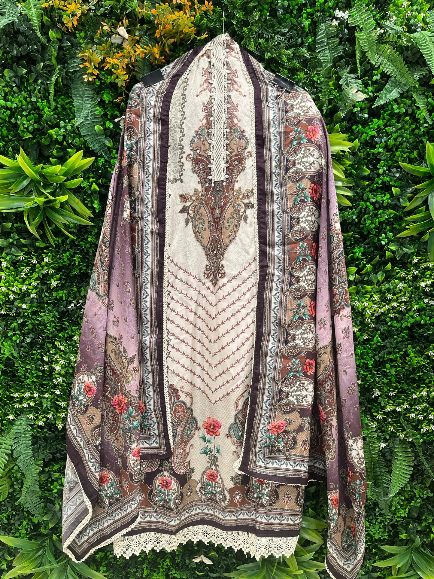 Elevate your ethnic wardrobe with this elegant unstitched suit set.
