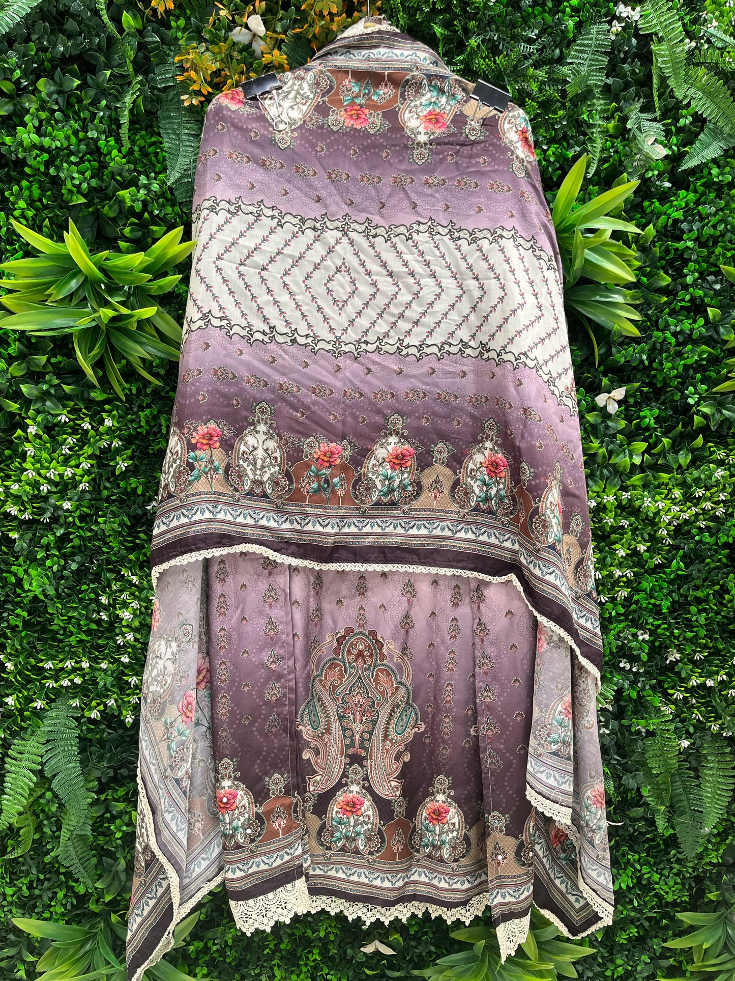 Elevate your ethnic wardrobe with this elegant unstitched suit set.