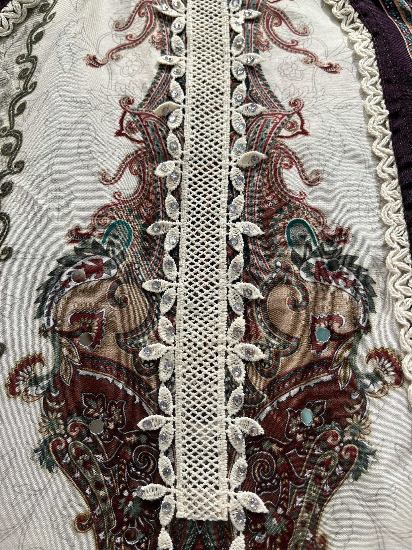 Elevate your ethnic wardrobe with this elegant unstitched suit set.