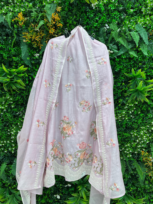 Elevate your ethnic wardrobe with this exquisite unstitched suit