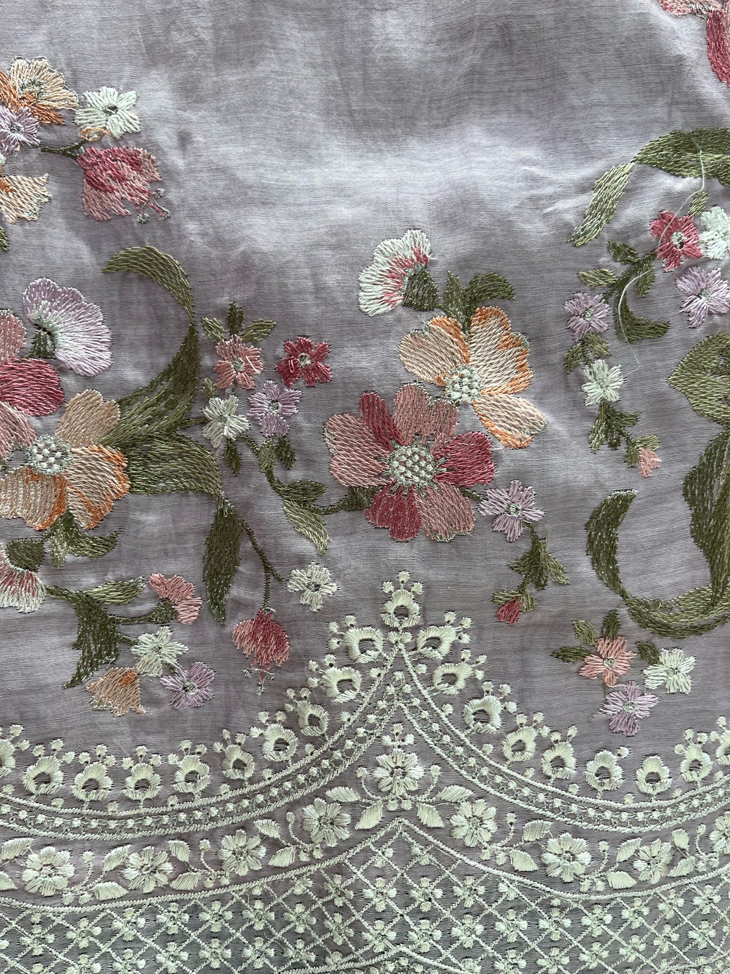 Elevate your ethnic wardrobe with this exquisite unstitched suit