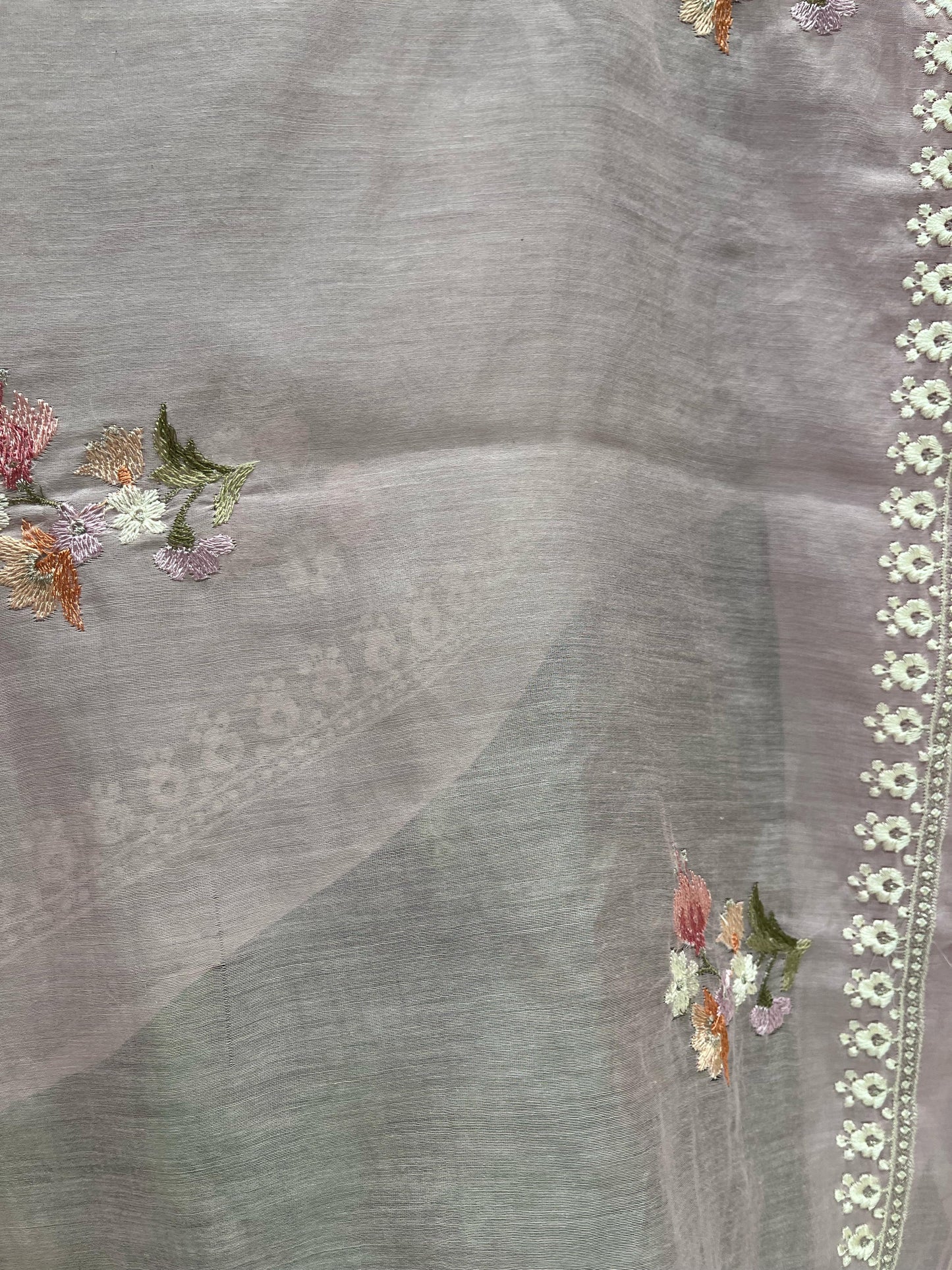 Elevate your ethnic wardrobe with this exquisite unstitched suit