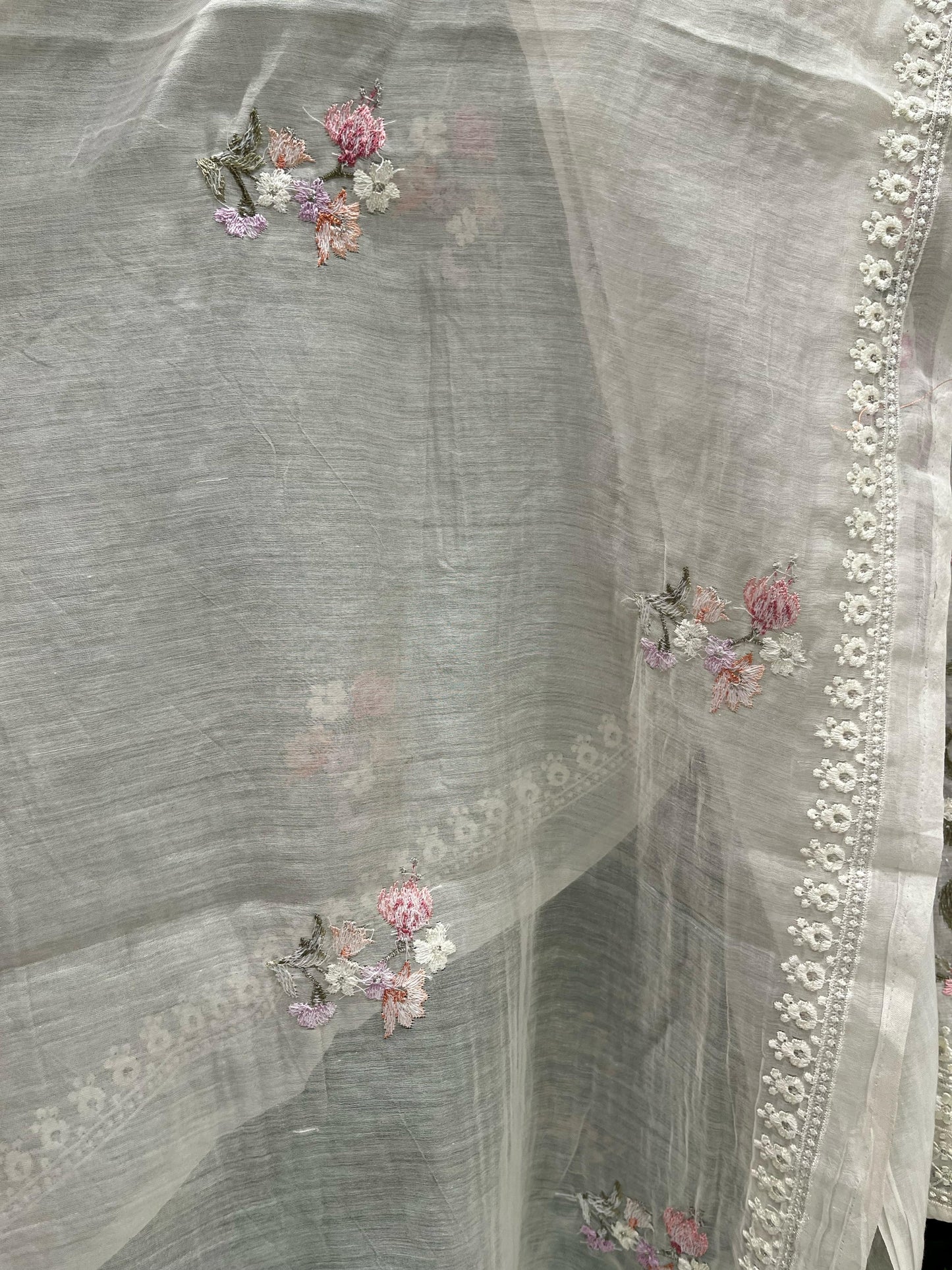 Elevate your ethnic wardrobe with this exquisite unstitched suit