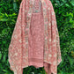 Elegance with this premium unstitched suit set, featuring a pure Georgette top adorned