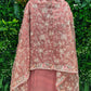 Elegance with this premium unstitched suit set, featuring a pure Georgette top adorned