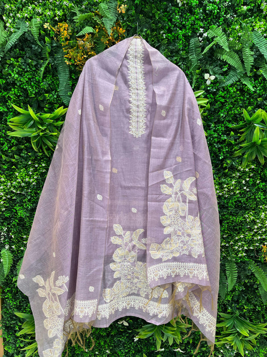 Elevate your ethnic wardrobe with this elegant unstitched suit set