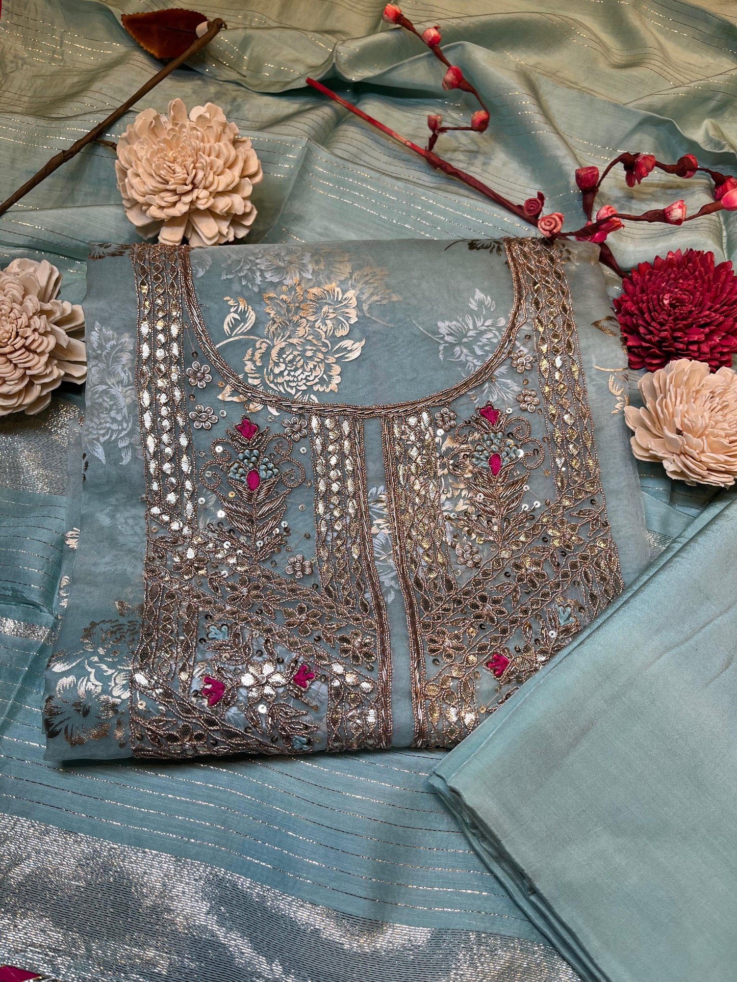 Discover timeless elegance with our premium unstitched suit
