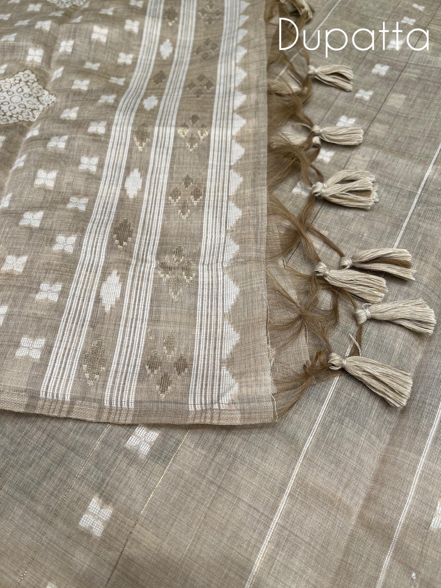 Elevate your ethnic wardrobe with this premium unstitched suit