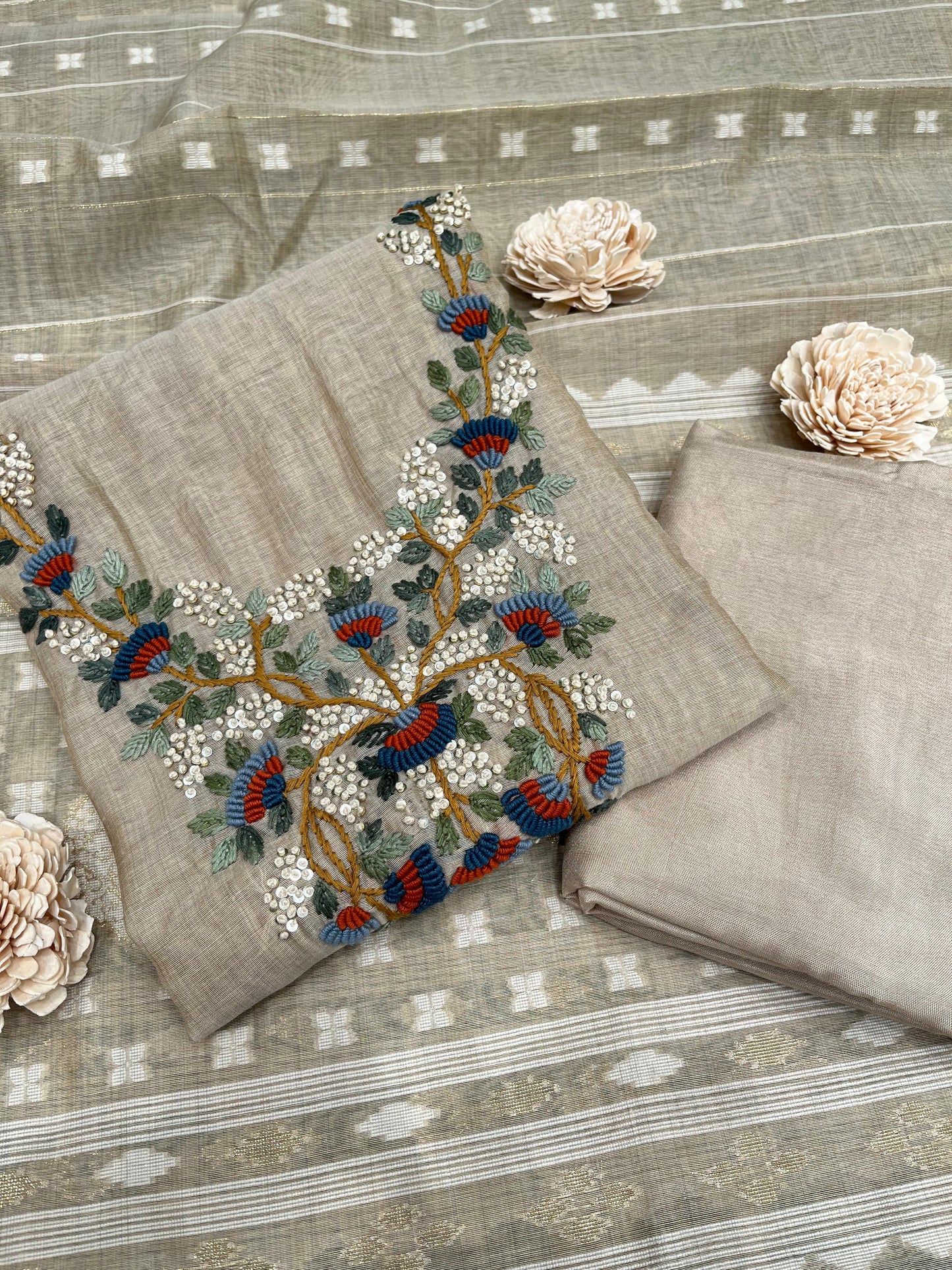 Elevate your ethnic wardrobe with this premium unstitched suit