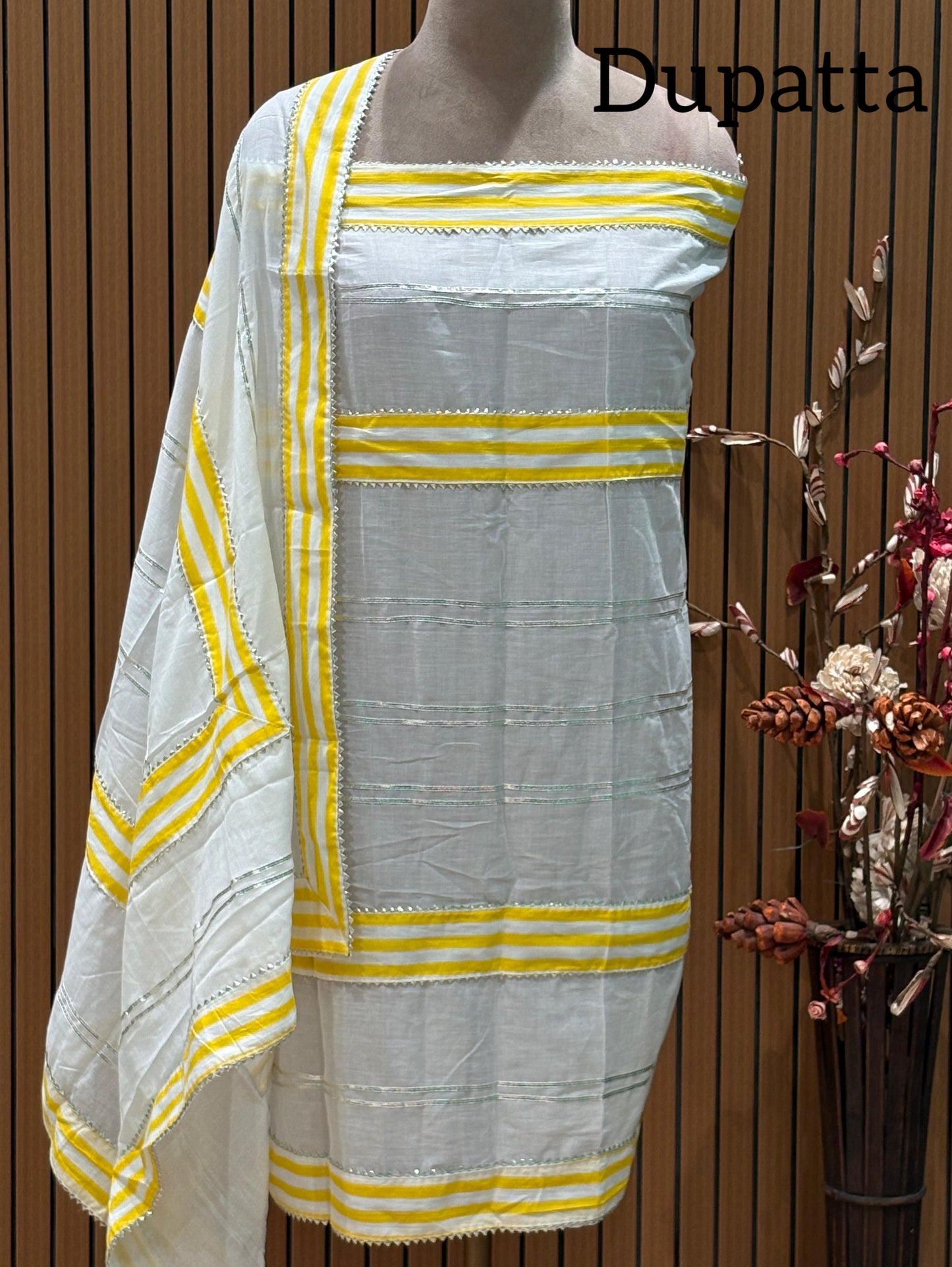 Embrace timeless elegance with our unstitched pure cotton suit