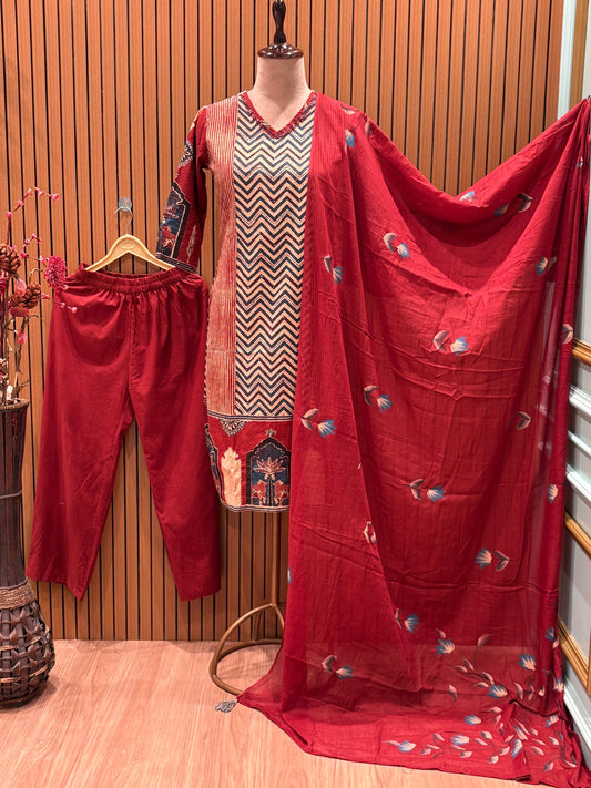 This vibrant red ethnic suit features a bold chevron-printed kurta