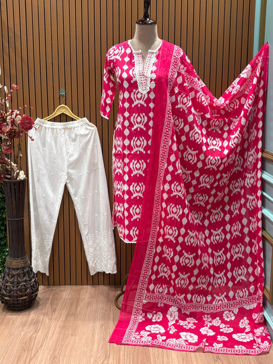 Vibrant pink and white ethnic suit set features a bold printed kurta
