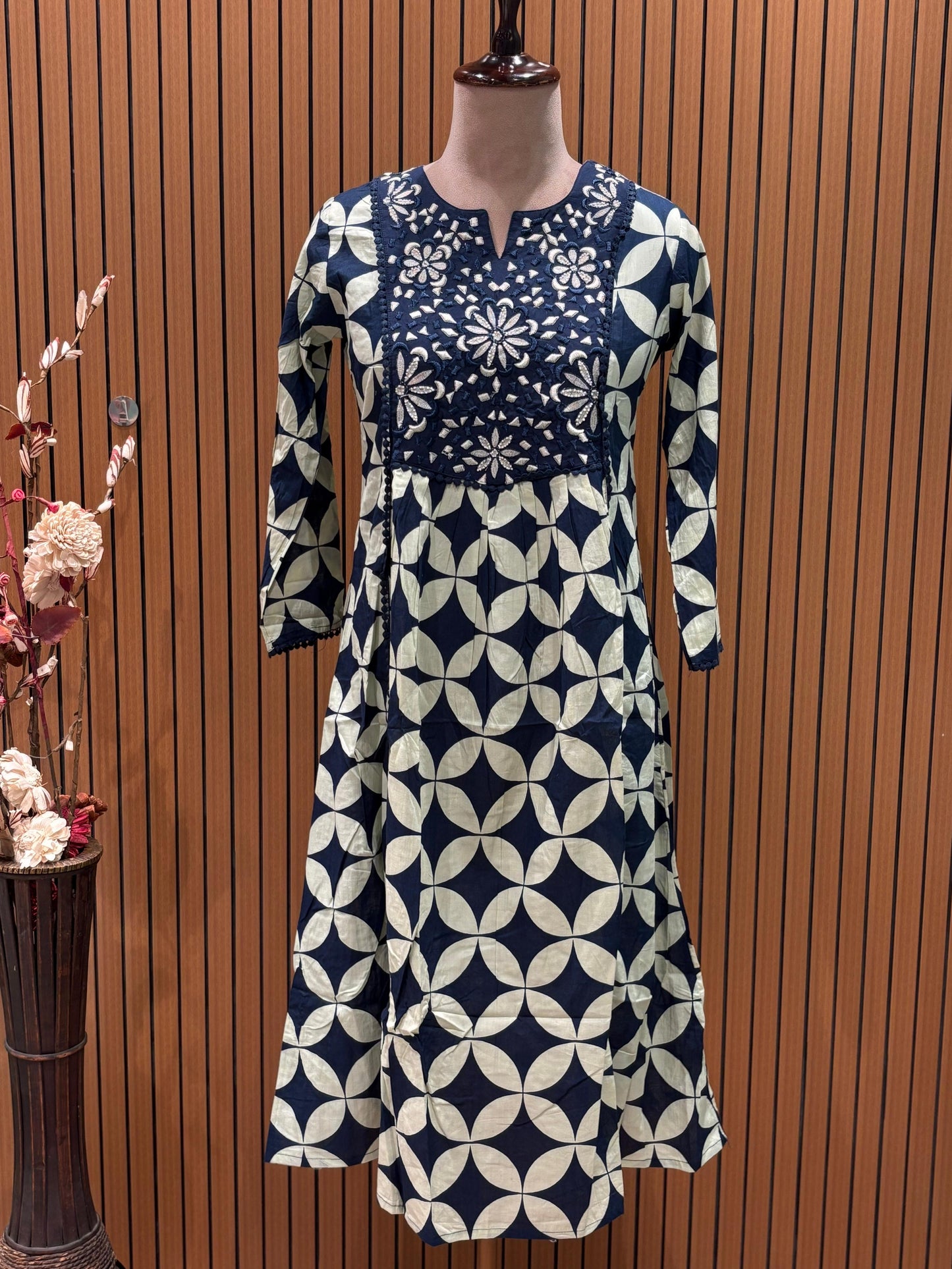 Elegant navy blue and cream suit set is a statement in timeless prints