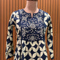 Elegant navy blue and cream suit set is a statement in timeless prints