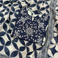 Elegant navy blue and cream suit set is a statement in timeless prints