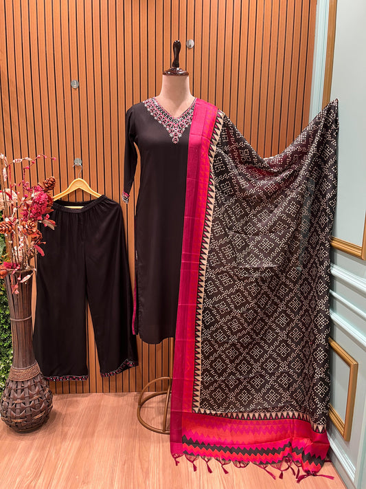 Elegant black salwar suit features intricate neckline embroidery
