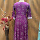 Vibrant purple ethnic set showcases intricate white thread embroidery