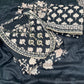 Black ethnic ensemble features elegant floral and vine prints