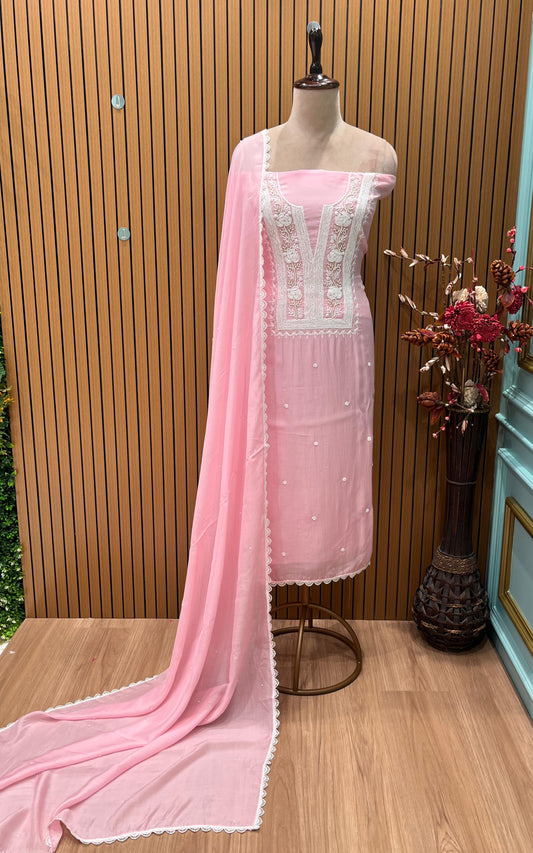 Add a touch of grace to your wardrobe with this elegant unstitched suit