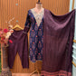 Elegant navy blue three-piece suit features floral embroidery on the neckline,