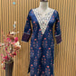 Elegant navy blue three-piece suit features floral embroidery on the neckline,