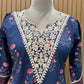 Elegant navy blue three-piece suit features floral embroidery on the neckline,
