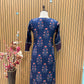 Elegant navy blue three-piece suit features floral embroidery on the neckline,