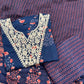 Elegant navy blue three-piece suit features floral embroidery on the neckline,
